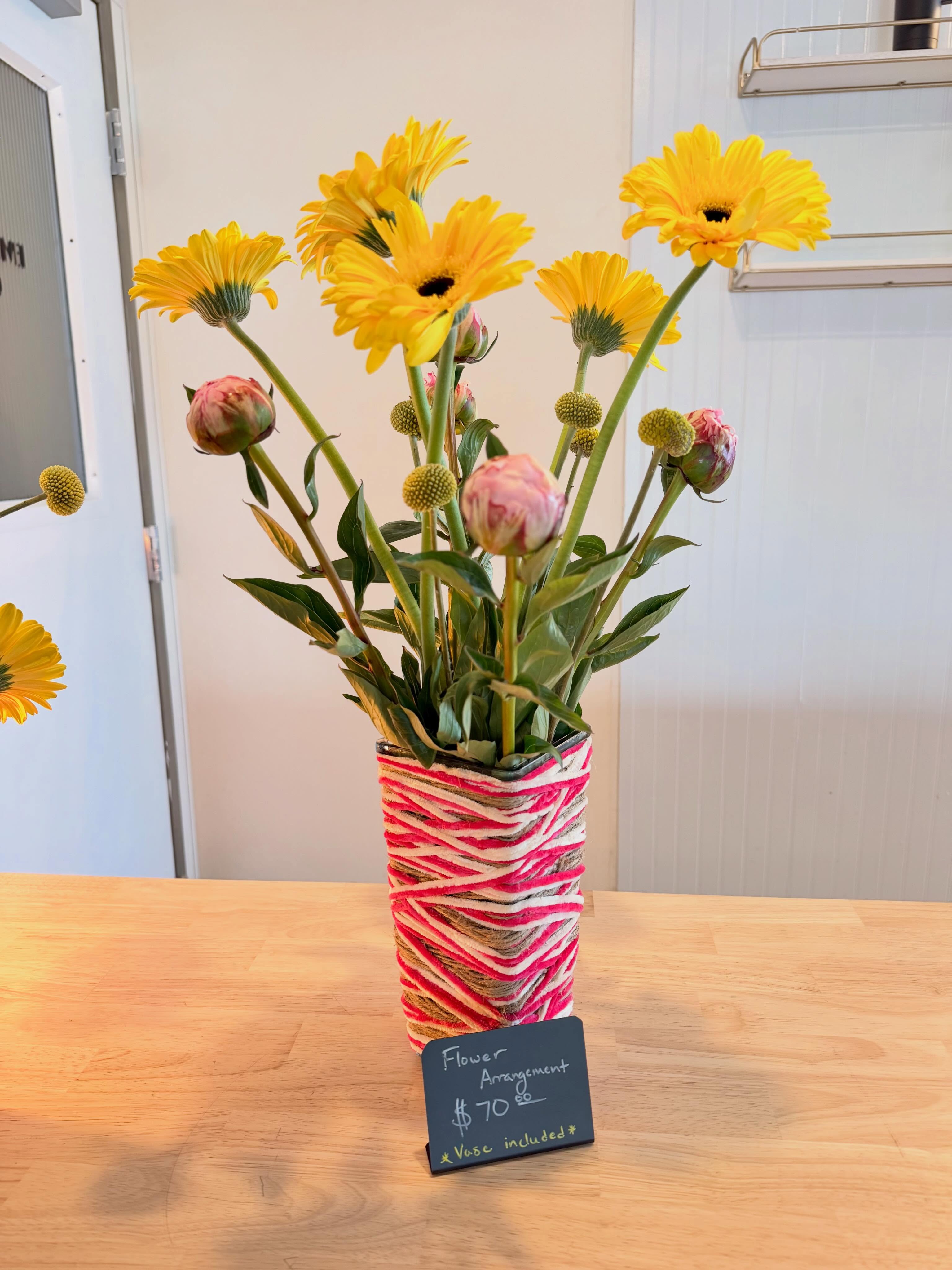 Fresh flower arrangement for sale on the counter