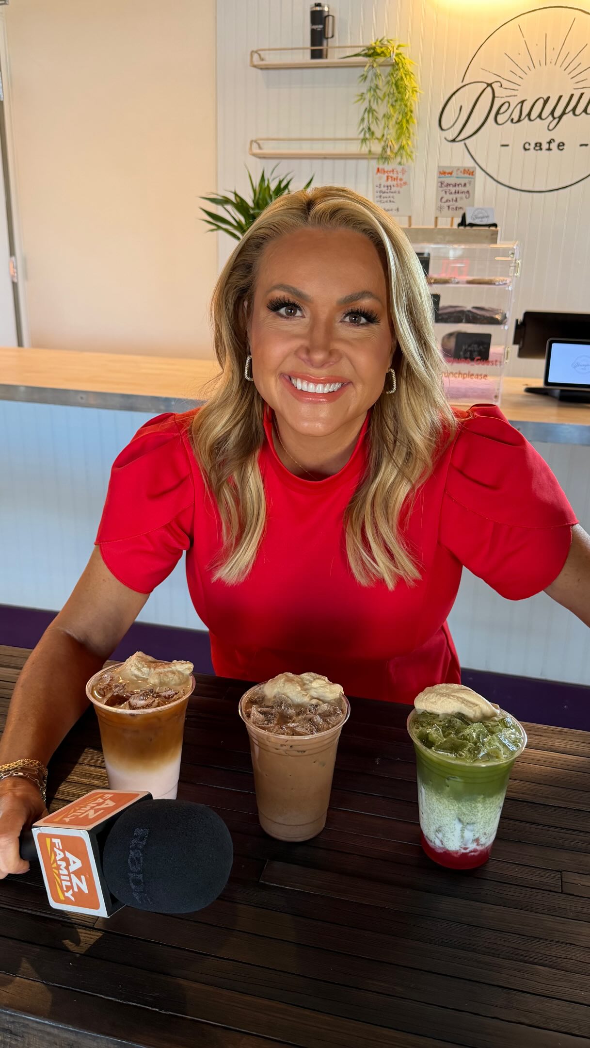 Local news segment filmed at Desayuno Cafe with three drinks on the counter